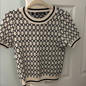 Adrianna Papell Black and Cream Geometric Short Sleeve Top. Never worn